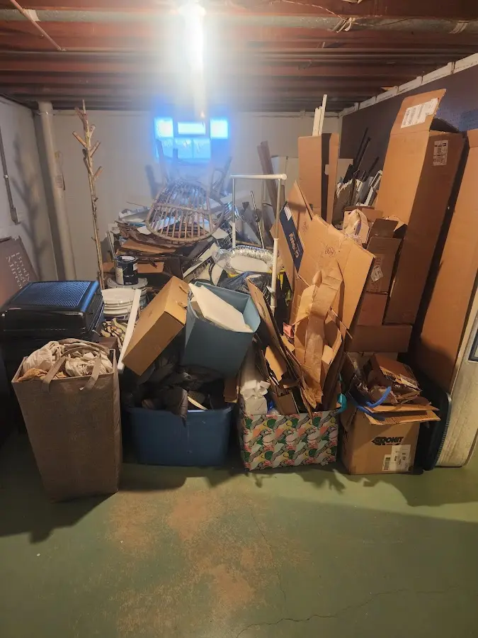 Roll-off dumpster container at job site for Yard Waste Dumpster Rental in Bar Harbor